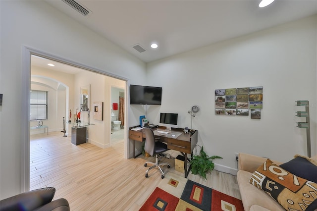 807 Chipper Dr, Sun City Center, FL 33573 - office area featuring recessed lighting, wood finished floors, visible vents, and arched walkways