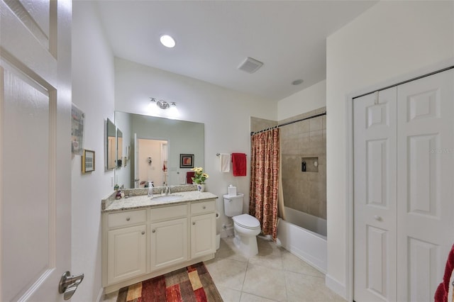 807 Chipper Dr, Sun City Center, FL 33573 - full bathroom featuring tile patterned floors, visible vents, toilet, shower / bath combination with curtain, and vanity