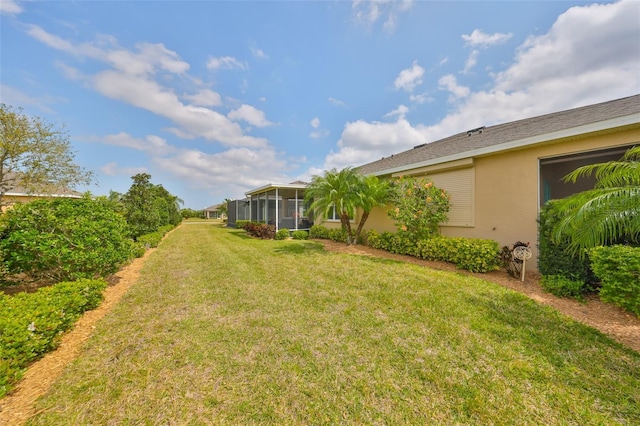 807 Chipper Dr, Sun City Center, FL 33573 - view of yard featuring a sunroom