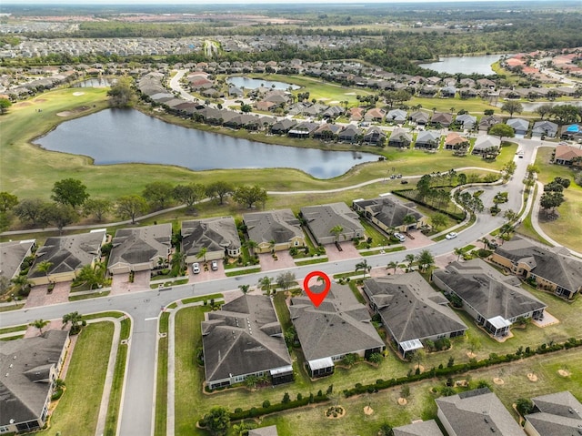 807 Chipper Dr, Sun City Center, FL 33573 - bird's eye view featuring a residential view, golf course view, and a water view