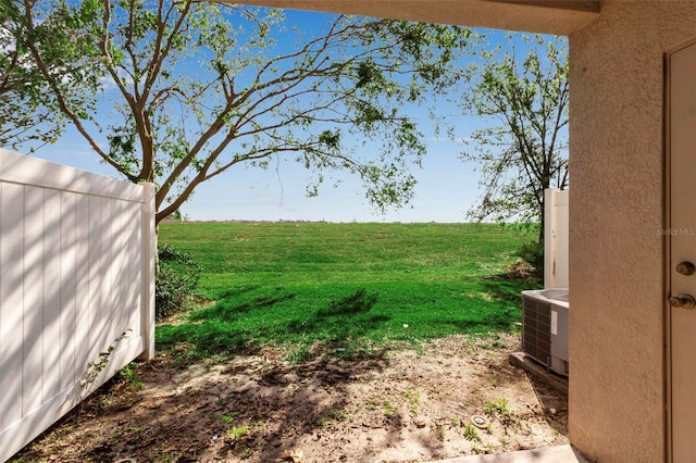 view of yard featuring central AC