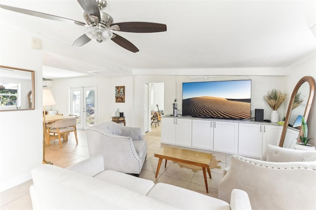 living room featuring light tile patterned floors, plenty of natural light, a ceiling fan, and a wall unit AC