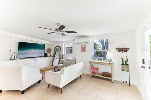 living room with a ceiling fan, light tile patterned flooring, a healthy amount of sunlight, and a wall mounted AC