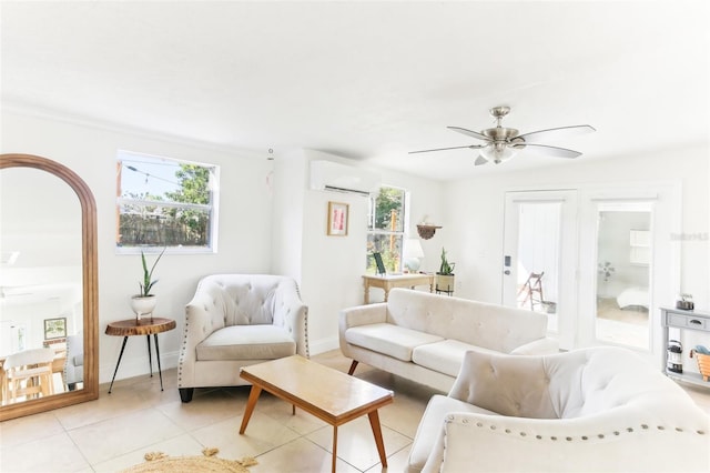 living area with plenty of natural light, an AC wall unit, and ceiling fan