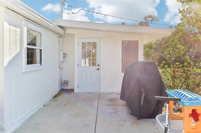 doorway to property featuring a patio