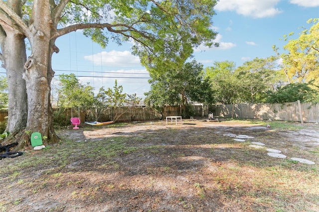 view of yard with a fenced backyard