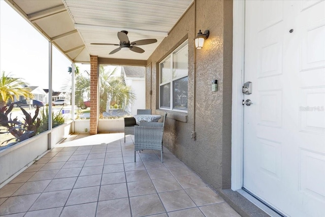 view of patio / terrace with a porch and a ceiling fan