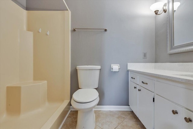 full bathroom with tile patterned floors, toilet, a shower, baseboards, and vanity