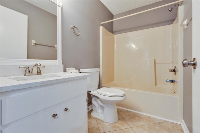 full bathroom featuring toilet, a textured ceiling, tile patterned flooring, bathing tub / shower combination, and vanity