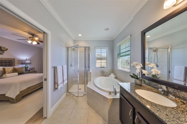 ensuite bathroom with tile patterned floors, a garden tub, a stall shower, and ornamental molding