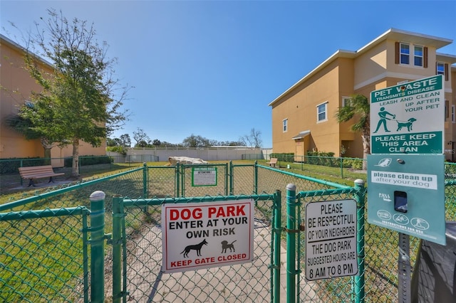 exterior space featuring a gate and fence