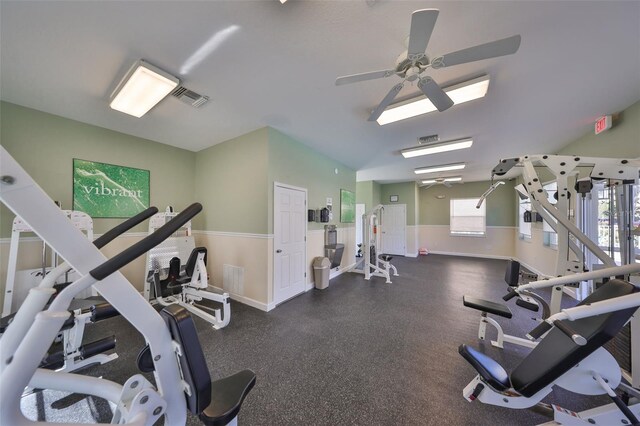 workout area with visible vents, baseboards, and ceiling fan