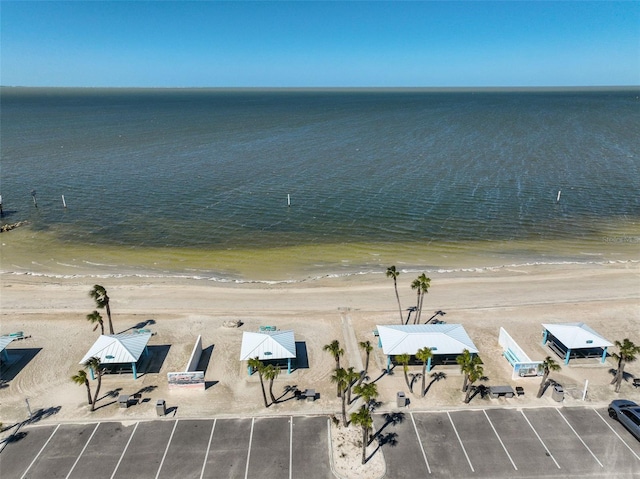 bird's eye view featuring a beach view and a water view