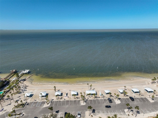 bird's eye view with a beach view and a water view