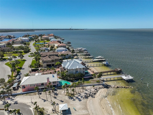 aerial view with a water view and a residential view