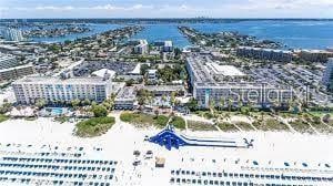 bird's eye view featuring a water view and a view of city