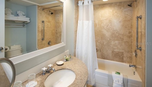 bathroom featuring vanity, toilet, and shower / tub combo with curtain