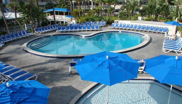 view of swimming pool featuring a patio