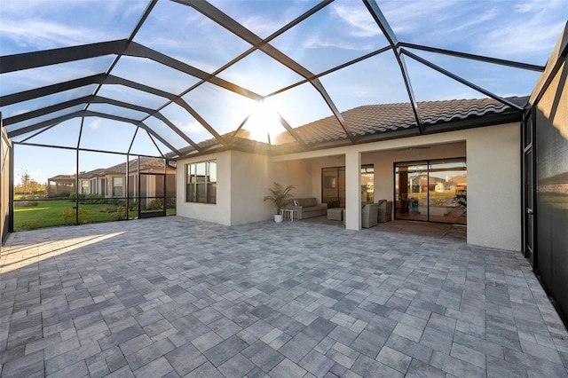 unfurnished sunroom with vaulted ceiling