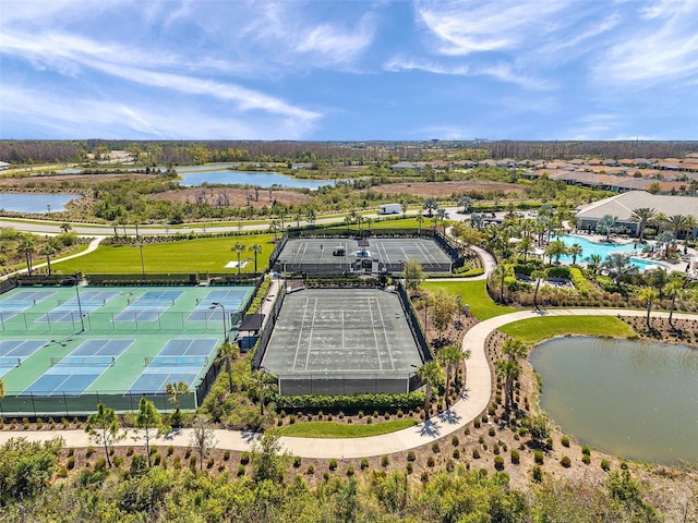 drone / aerial view with a water view