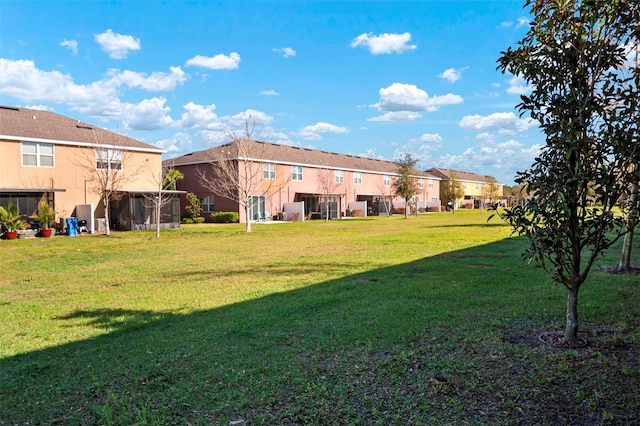 view of yard featuring a residential view