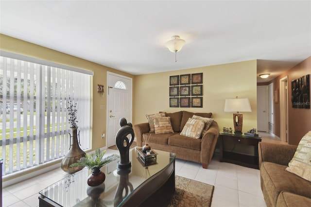 living area featuring light tile patterned floors