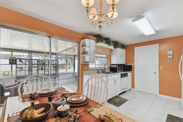 dining area featuring light tile patterned flooring, baseboards, and an inviting chandelier