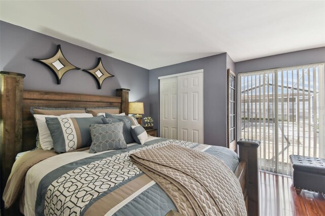 bedroom featuring a closet and wood finished floors