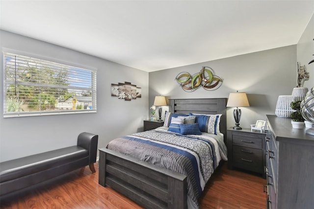 bedroom featuring dark wood-type flooring