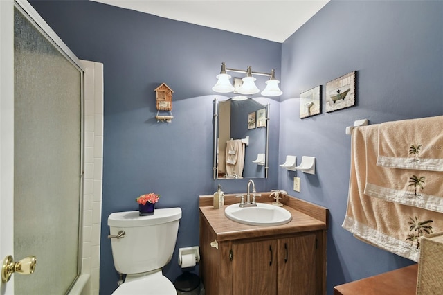 full bathroom with a shower with door, toilet, and vanity