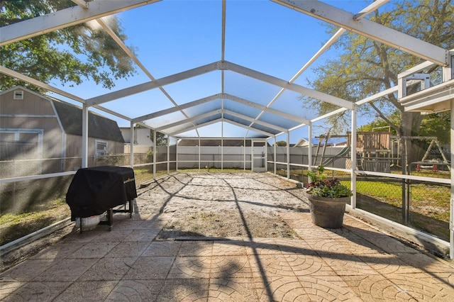 unfurnished sunroom with vaulted ceiling