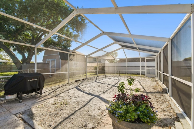 sunroom featuring vaulted ceiling