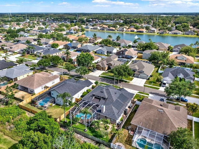 aerial view featuring a water view and a residential view