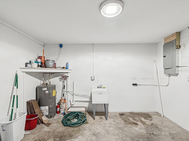 finished basement featuring water heater, concrete block wall, and electric panel