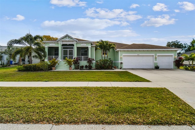 view of front facade with an attached garage, concrete driveway, and a front lawn