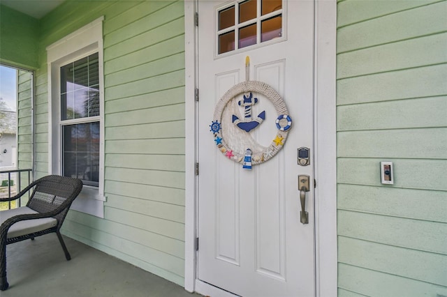 entrance to property with a porch