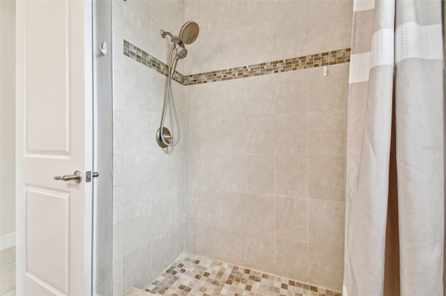 full bathroom featuring a stall shower