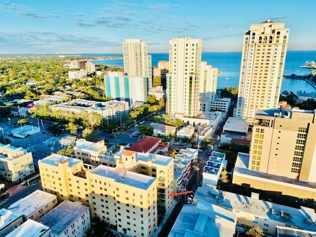 aerial view featuring a view of city and a water view