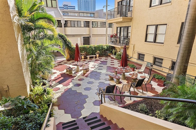 surrounding community featuring a patio area