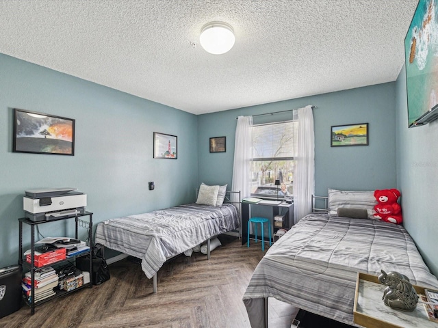 bedroom featuring a textured ceiling