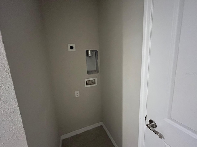 laundry room with laundry area, electric dryer hookup, and baseboards