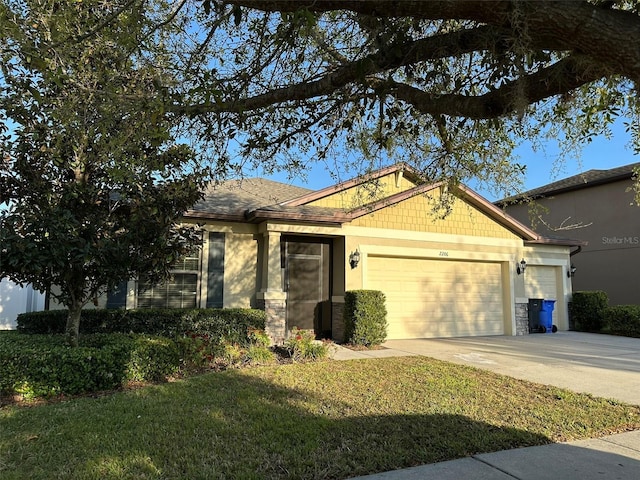 view of front of home featuring a garage, stone siding, concrete driveway, and a front lawn