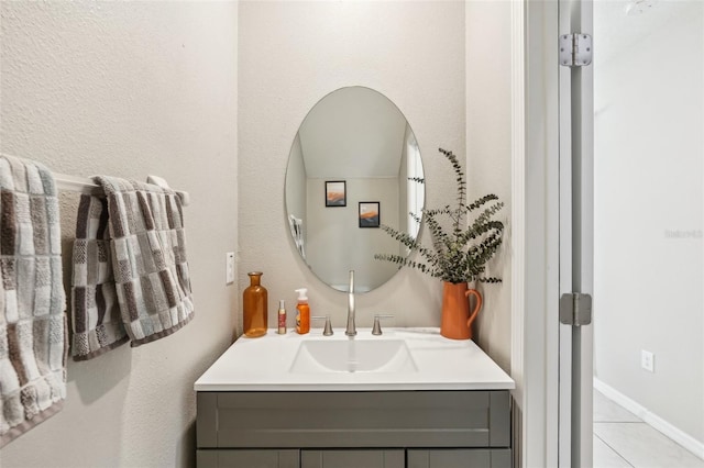 bathroom featuring vanity and tile patterned flooring