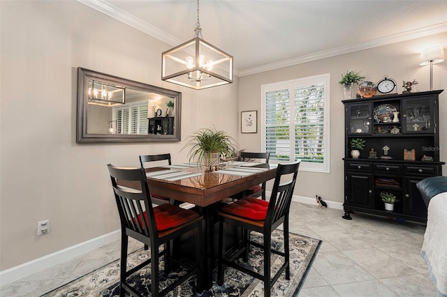 dining room featuring an inviting chandelier, light tile patterned flooring, baseboards, and ornamental molding