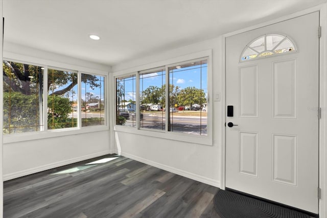 unfurnished sunroom featuring plenty of natural light