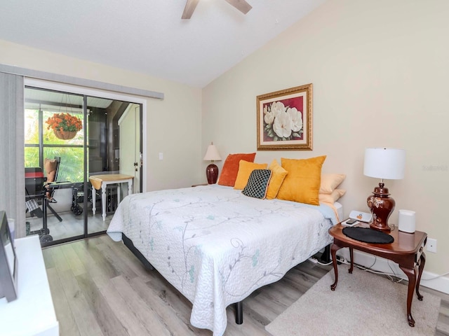 5100 Burchette Rd Unit 500, Tampa, FL 33647 - bedroom with ceiling fan, lofted ceiling, wood finished floors, and access to exterior