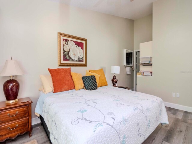 5100 Burchette Rd Unit 500, Tampa, FL 33647 - bedroom with baseboards and wood finished floors