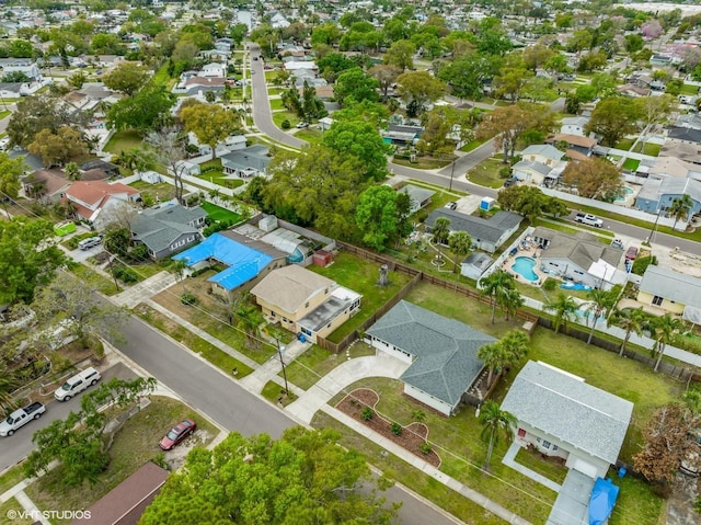 birds eye view of property with a residential view