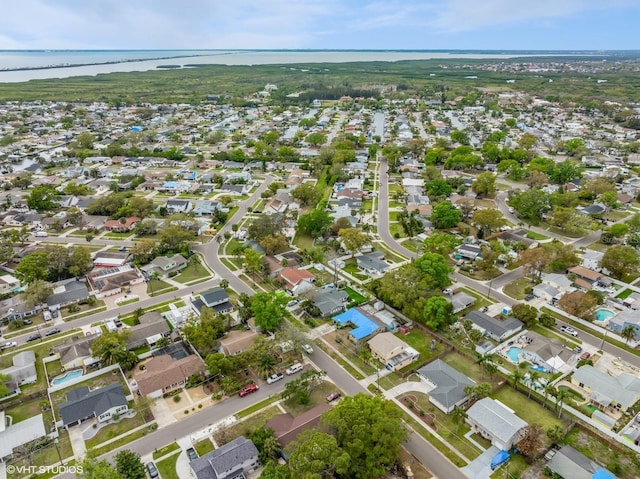 aerial view with a water view and a residential view