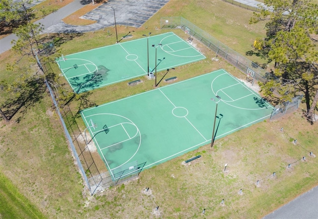 view of sport court featuring community basketball court and fence